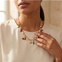 Tory Burch gold tone 21.5 inch chain necklace with colorful cactus, banana, seashell, cherry, red lips, T medallion and simulated pearl charms.