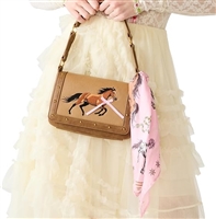 Betsey Johnson The Mane Event brown Western shoulder bag featuring an embroidered running horse with pink ribbon detail, gold tone studs, structured handle, and pink equestrian inspired scarf.