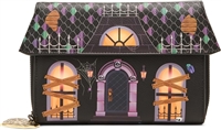 Betsey Johnson Boo and Breakfast haunted house wallet on chain crossbody featuring a black mansion design with glowing windows, boarded details, spiderwebs, skull accents, and colorful roof graphics.