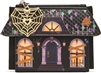 Betsey Johnson Boo and Breakfast black haunted house bifold wallet featuring glowing orange windows, boarded window graphics, purple and green roof details, spiderweb accents, and a gold tone spiderweb zipper charm.