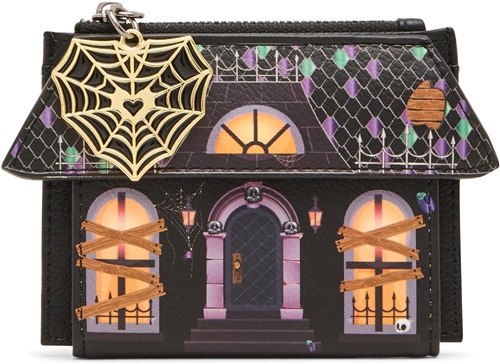 Betsey Johnson Boo and Breakfast black haunted house bifold wallet featuring glowing orange windows, boarded window graphics, purple and green roof details, spiderweb accents, and a gold tone spiderweb zipper charm.