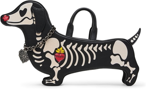 Betsey Johnson Weenie and the Beast black and white novelty crossbody handbag shaped like a dachshund with skeleton bone graphics, dimensional dog details, and long black strap.
