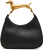 Betsey Johnson black mini hobo crossbody bag with curved silhouette, sculptural gold tone dachshund dog top handle and adjustable black shoulder strap.