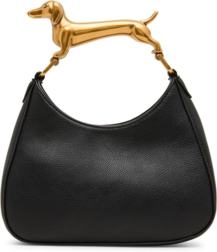 Betsey Johnson black mini hobo crossbody bag with curved silhouette, sculptural gold tone dachshund dog top handle and adjustable black shoulder strap.