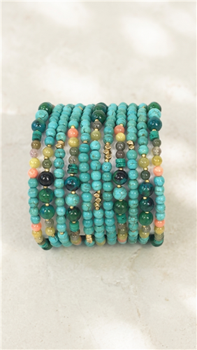 Nakamol 11 strand turquoise beaded bracelet with Czech crystal and stone beads in turquoise, green, coral and neutral tones with small gold tone accents.