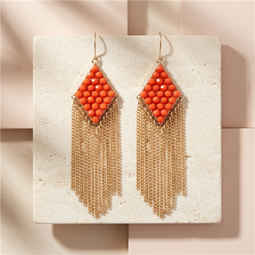 Amrita Singh Katie coral resin stone drop earrings with diamond shaped coral bead clusters, cascading gold tone chain fringe, French hook ear wires, and a 3.5 inch statement length.