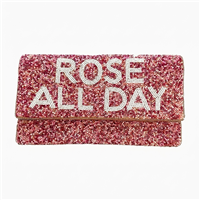 Fashion Culture Rose All Day fold over clutch featuring pink hand beaded construction, white statement lettering, fold over design, fabric lined interior, and detachable chain crossbody strap.