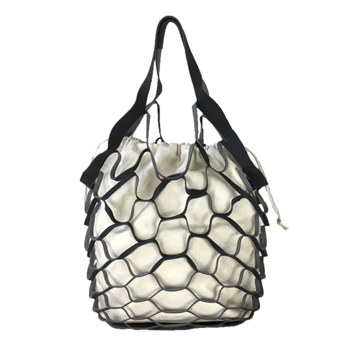 Fashion Culture black tote bag featuring a geometric open-weave nubuck and synthetic leather exterior, removable canvas drawstring pouch, double shoulder straps, flat base, and collapsible travel-friendly construction.