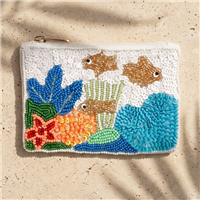 Hand beaded white zip coin purse featuring tropical fish, coral reef, sea plants, and ocean wave motifs in blue, aqua, coral, green, and gold beadwork with textured sequin accents inspired by underwater marine life.