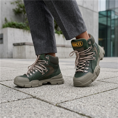 Gucci x SEGA Flashtrek hiking booties in olive green suede and leather featuring chunky oversized soles, hiking laces, signature SEGA logo tongue patch, and luxury designer sneaker styling in Womens Size 35 US 5 New In Box.