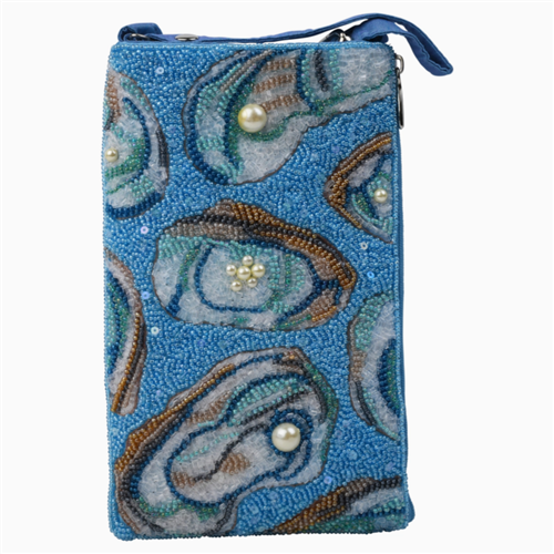 Bamboo Trading Company blue beaded phone crossbody featuring dimensional oyster shell motifs, pearl inspired accents, open top phone compartment, and adjustable shoulder strap.