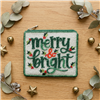 Bamboo Trading Company Merry and Bright multicolor Christmas beaded zip pouch card case with festive holiday motifs and fabric back.