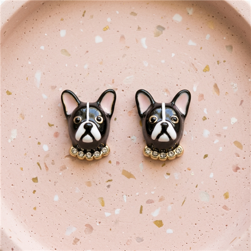 Kate Spade New York black and white French Bulldog stud earrings with pink ear details, gold tone accents and sparkling clear crystal collars.