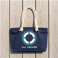 Navy blue Kate Spade New York cotton canvas tote bag with All Aboard nautical graphic, double rope shoulder straps, zip top closure, and casual coastal beach style design.